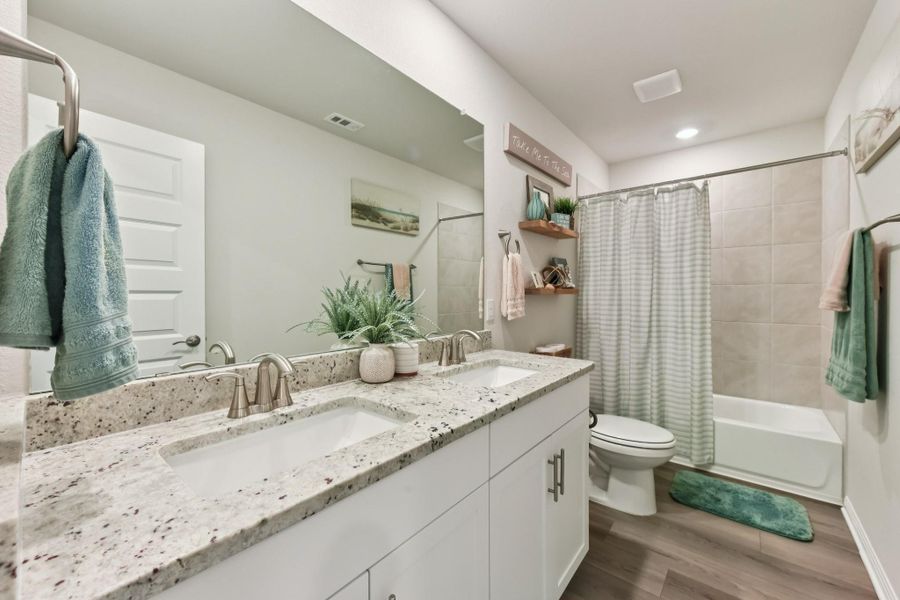 Furnished interior view inside a new home in Big Sky Ranch - Executive Collection, Dripping Springs (Image 27).