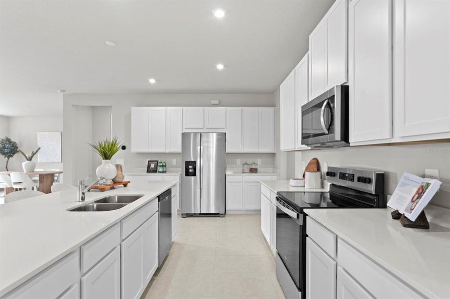 Furnished interior view inside a new home in Windwater, Parrish (Image 9).
