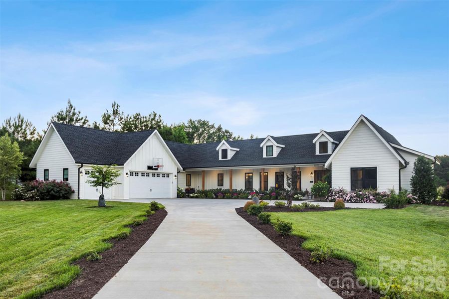 Front exterior of a new home in , Rock Hill, SC, highlighting curb appeal (Image 24).