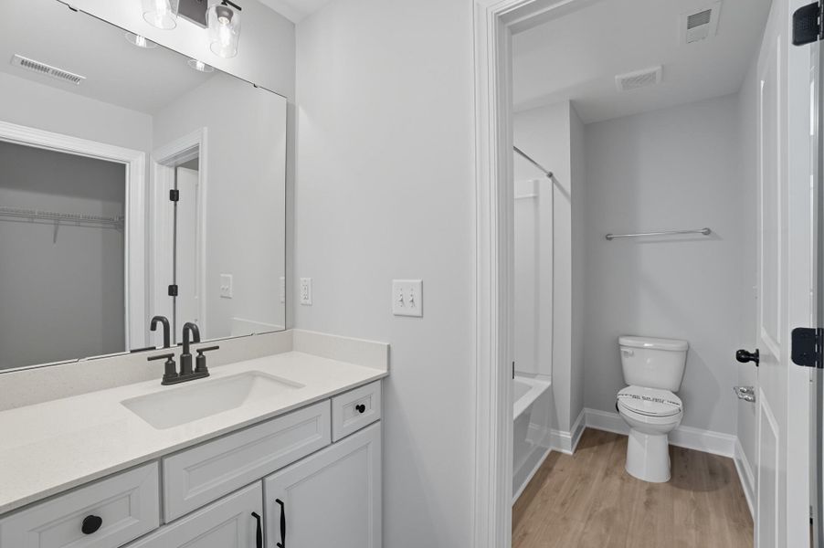 Furnished interior view inside a new home in Heritage - 55+ Community, Wesley Chapel (Image 12).