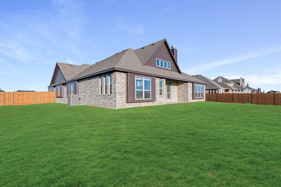 Exterior details and patio area of a home in Coyote Crossing, Godley (Image 25). Exterior details and patio area of a home in Coyote Crossing, Godley (Image 25).