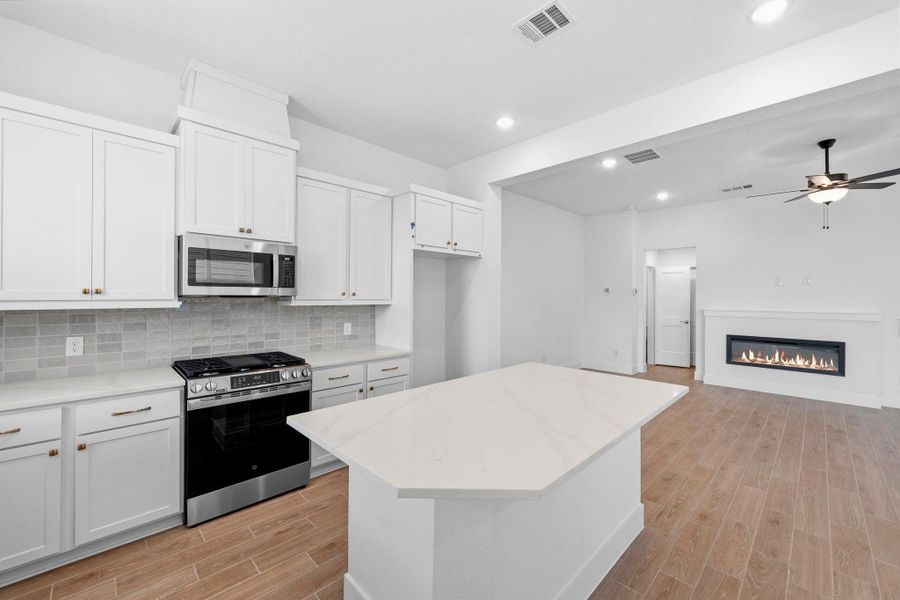 Furnished interior view inside a new home in Bridgeland, Cypress (Image 5).