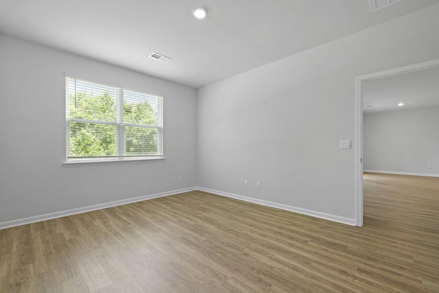 Spacious, unfurnished interior of a new home in Pineview North, Summerville (Image 27).