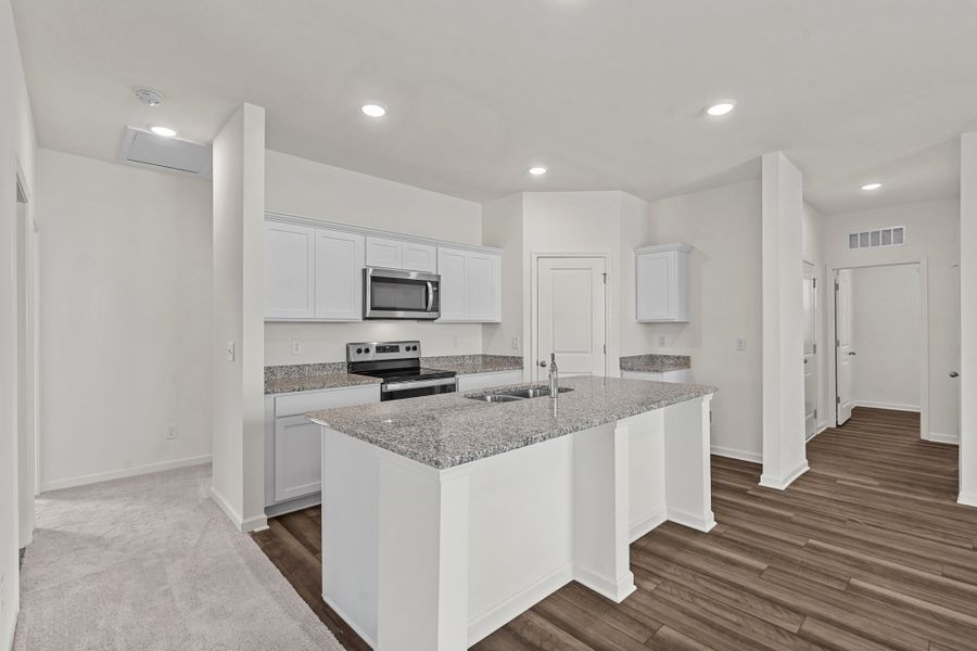 Representative furnished interior of a home built from the Glimmer by Starlight Homes in The Wilder, Adkins (Image 9). Representative furnished interior of a home built from the Glimmer by Starlight Homes in The Wilder, Adkins (Image 9).