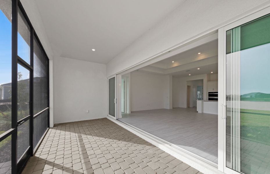Exterior details and patio area of a home in TerraWalk at Babcock Ranch, Alva (Image 3).