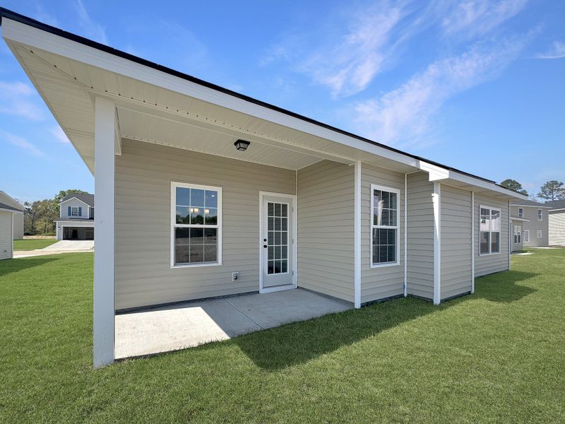 Exterior details and patio area of a home in Grand Reserve, Ludowici (Image 2).
