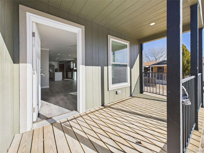 Covered Front Porch – This inviting front porch offers a cozy space to relax and enjoy morning coffee or evening breezes, with direct access to the main living area.
