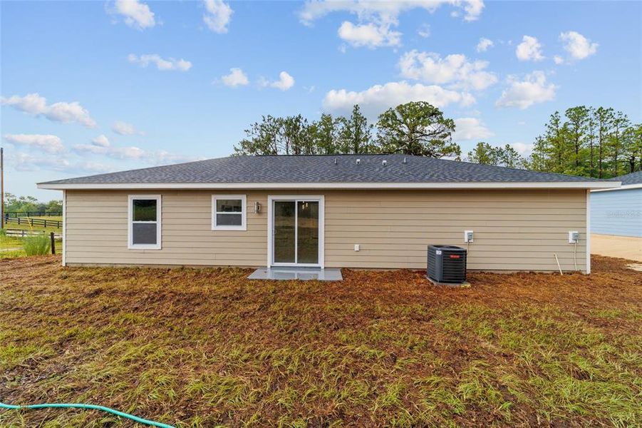 Front exterior of a new home in , Dunnellon, FL, highlighting curb appeal (Image 21).