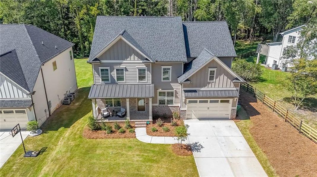 Front exterior of a new home in , Tucker, GA, highlighting curb appeal (Image 22).