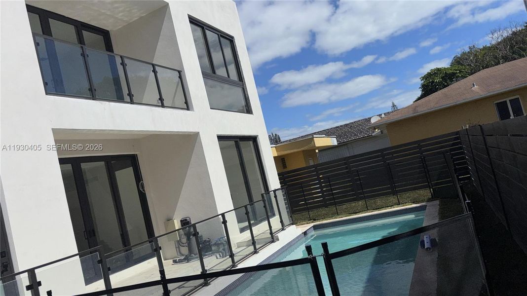 Exterior details and patio area of a home in , Miami (Image 4).