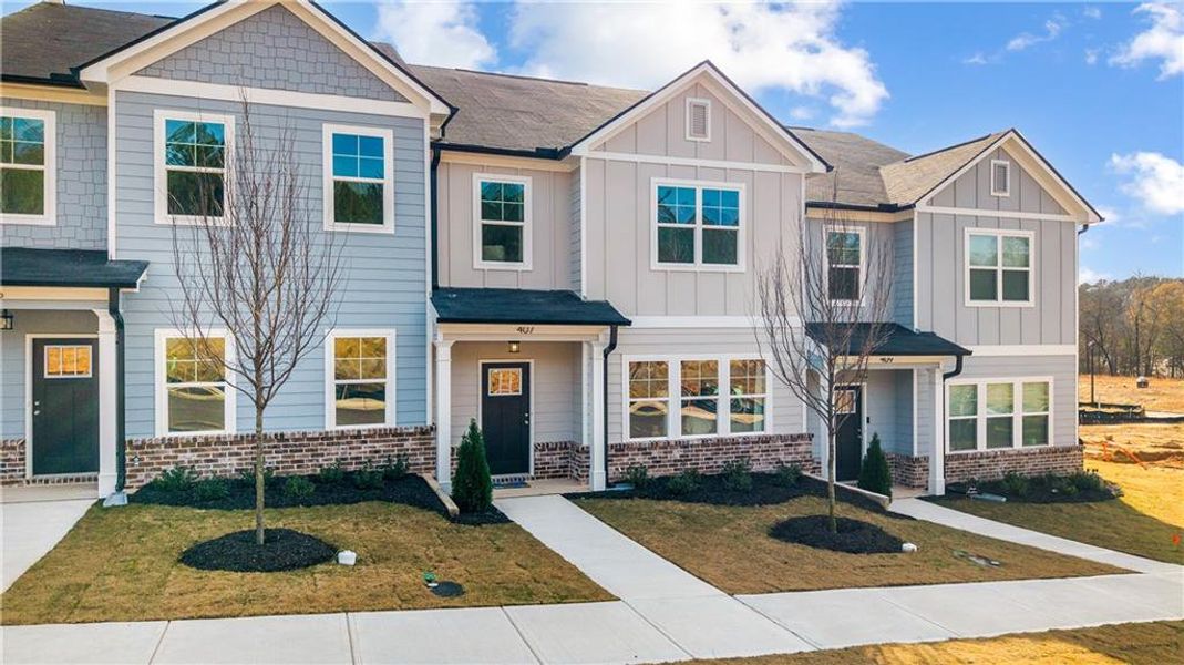 Front exterior of a new home in , Conyers, GA, highlighting curb appeal (Image 24).