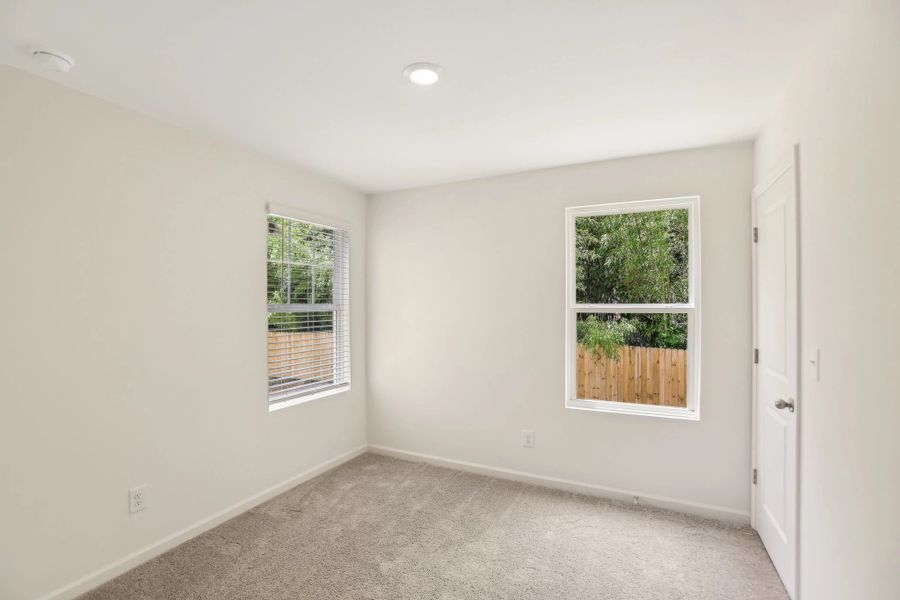 Representative unfurnished interior of a home built from the Triton by Starlight Homes in Kendall Grove, McDonough (Image 23).
