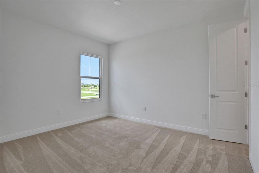 Spacious, unfurnished interior of a new home in Bungalow Walk at Lakewood Ranch, Sarasota (Image 24).