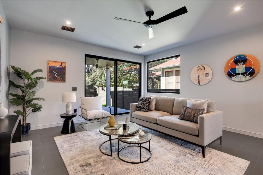 Sliding door off the livingroom allows indoor fun to flow outside to the covered patio.