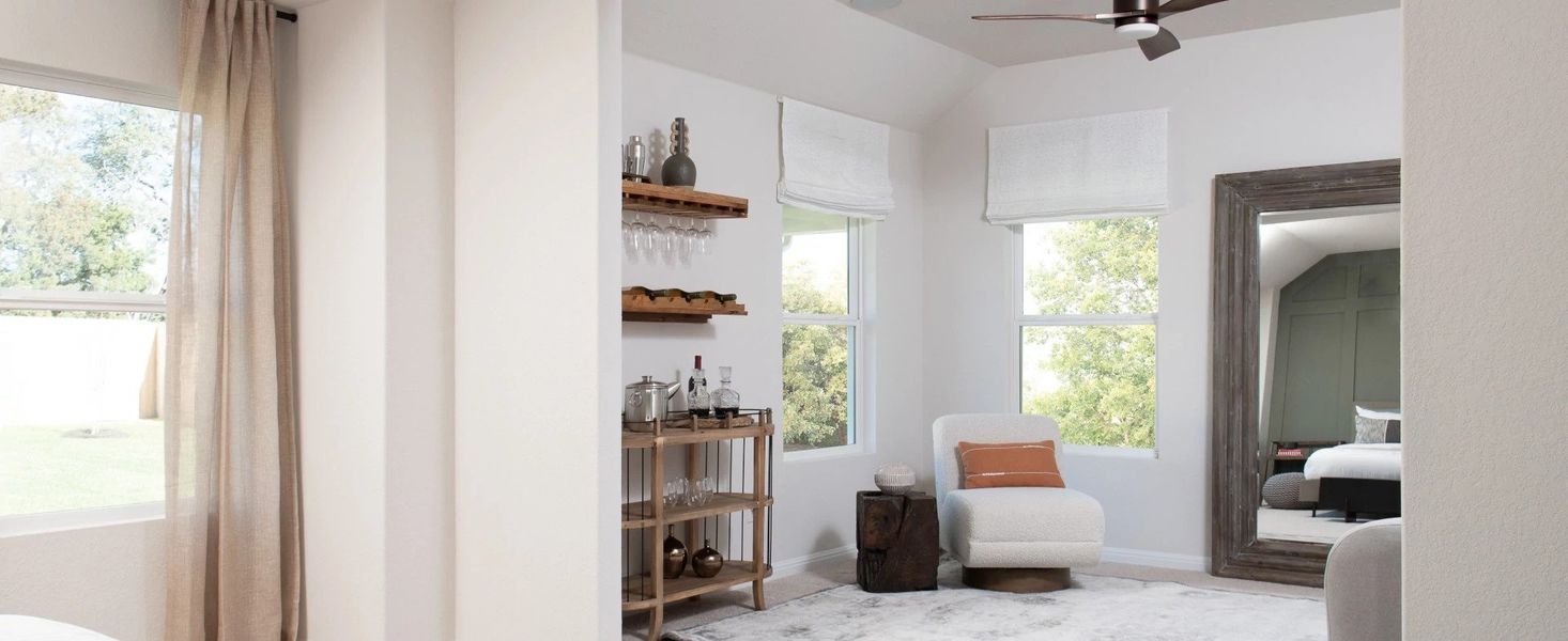 Representative furnished interior of a home built from the Medina II by Ashton Woods in The Colony 50s, Bastrop (Image 9).