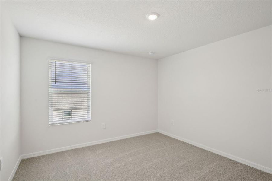 Spacious, unfurnished interior of a new home in Springs at Lake Alfred - Classic Series, Lake Alfred (Image 26).