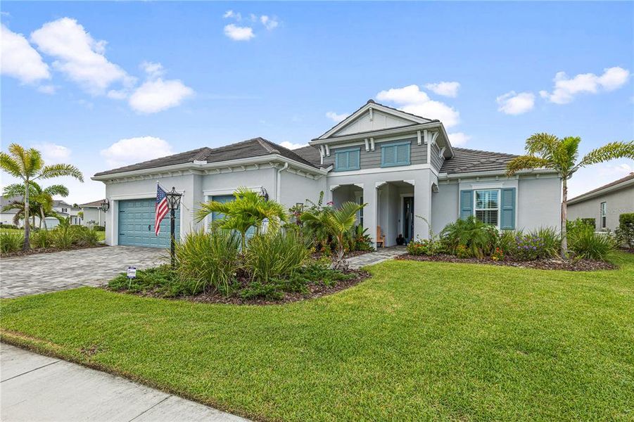 Front exterior of a new home in , Venice, FL, highlighting curb appeal (Image 1). Front exterior of a new home in , Venice, FL, highlighting curb appeal (Image 1).