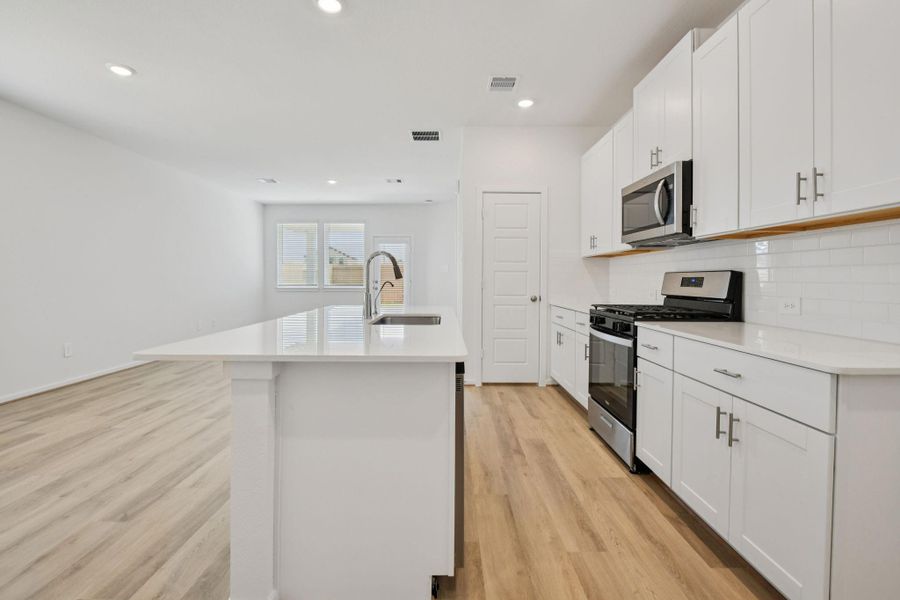 Furnished interior view inside a new home in Sundance Cove - Traditional Series, Crosby (Image 9).
