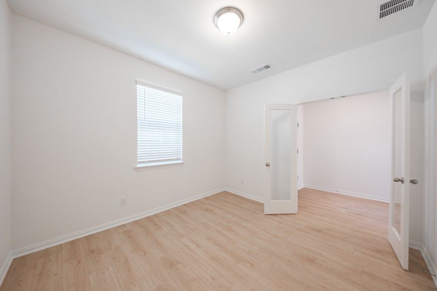 Spacious, unfurnished interior of a new home in The Villages of Hurricane Creek, Anna (Image 24).