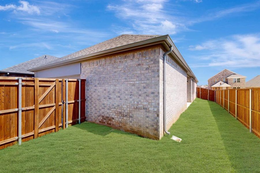 Exterior details and patio area of a home in Tarrytown, Crowley (Image 22).