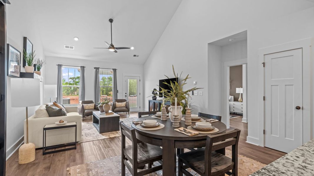 Tasteful dining area with current design in this vibrant two-story villa near Downtown Fountain Inn