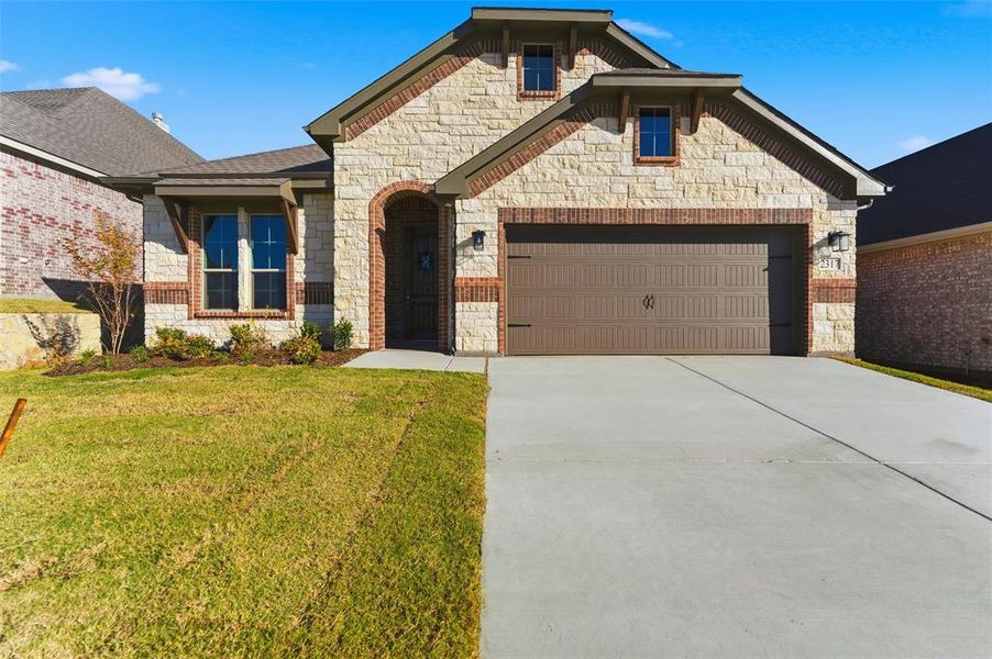 Front exterior of a new home in Waterford Park, Weatherford, TX, highlighting curb appeal (Image 22). Front exterior of a new home in Waterford Park, Weatherford, TX, highlighting curb appeal (Image 22).