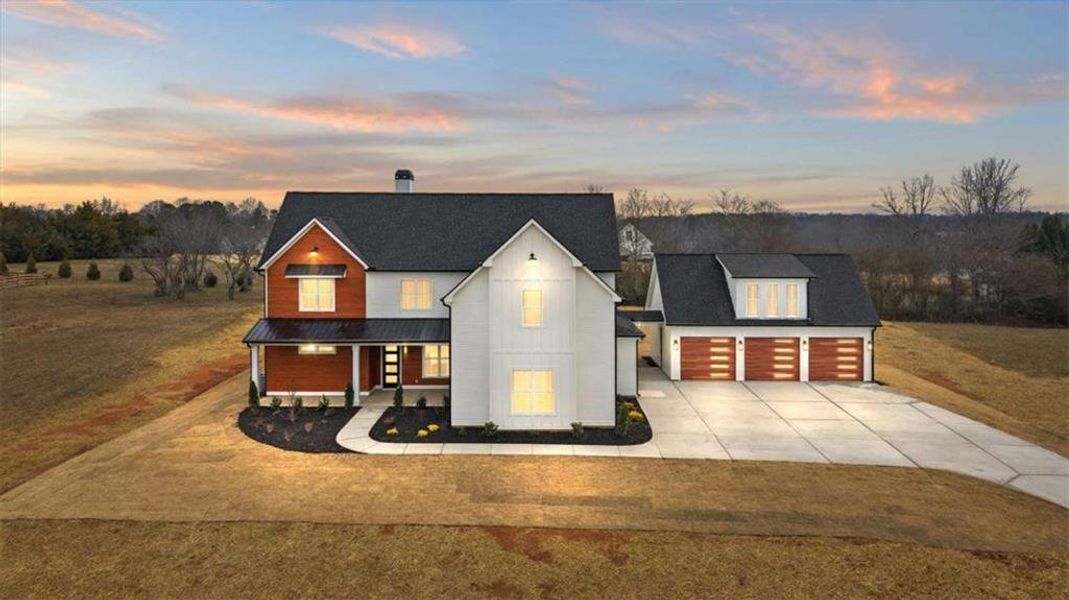 Front exterior of a new home in , Carrollton, GA, highlighting curb appeal (Image 27).