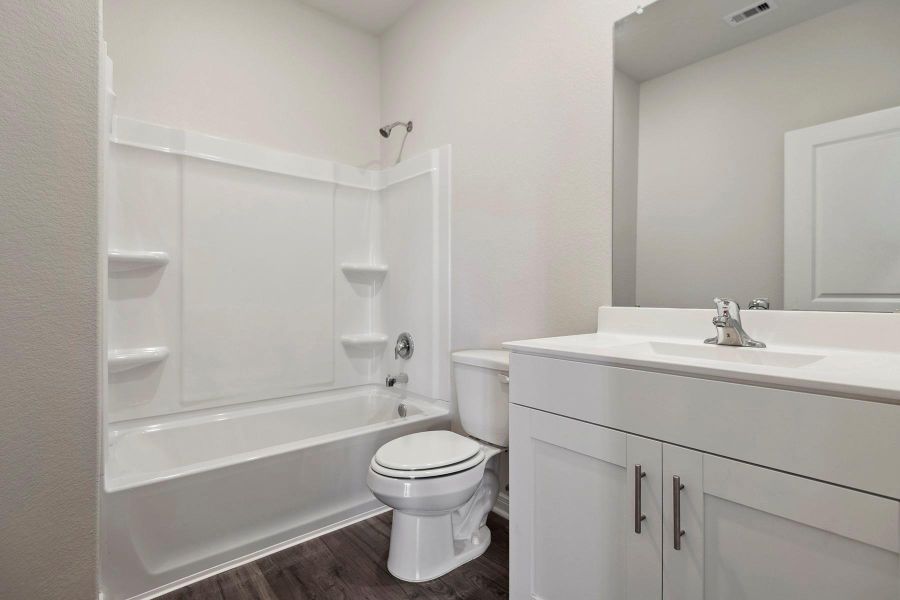 Furnished interior view inside a new home in Sweetwater Ridge, Conroe (Image 9).