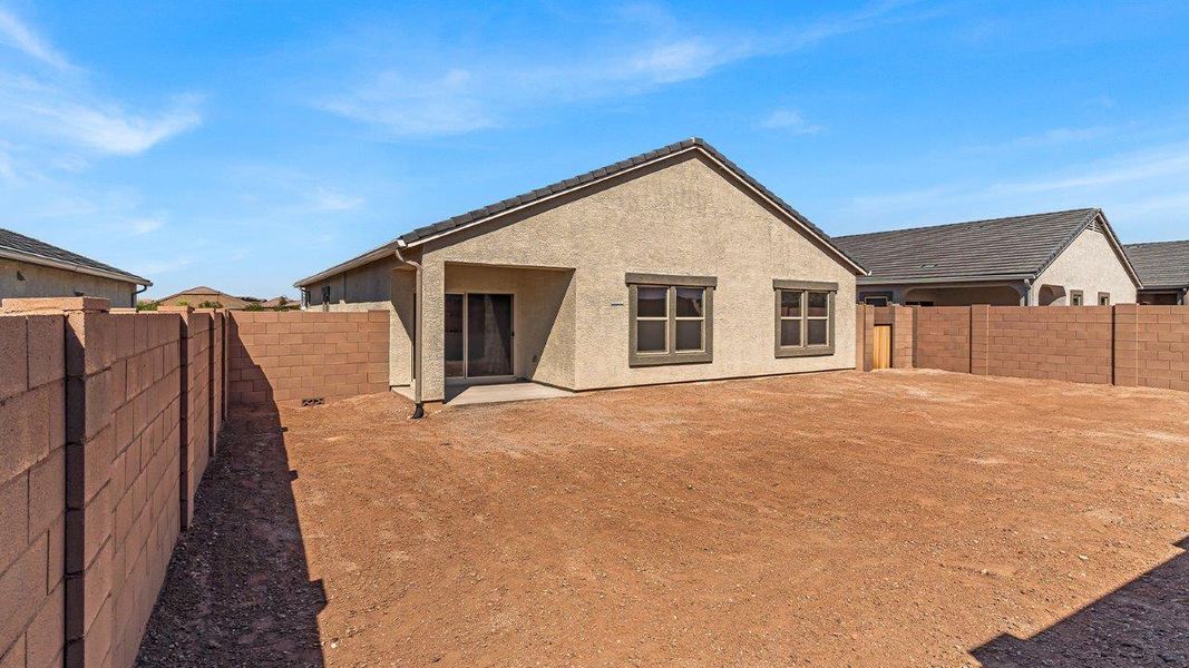 Front exterior of a new home in Barnett Village, Marana, AZ, highlighting curb appeal (Image 2).