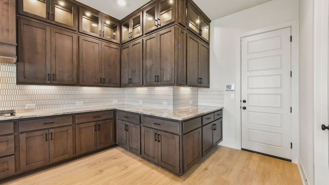 Furnished interior view inside a new home in Sunfield, Buda (Image 7).