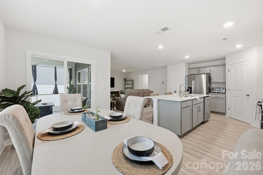 eat in dining area off kitchen, access to screened-in porch