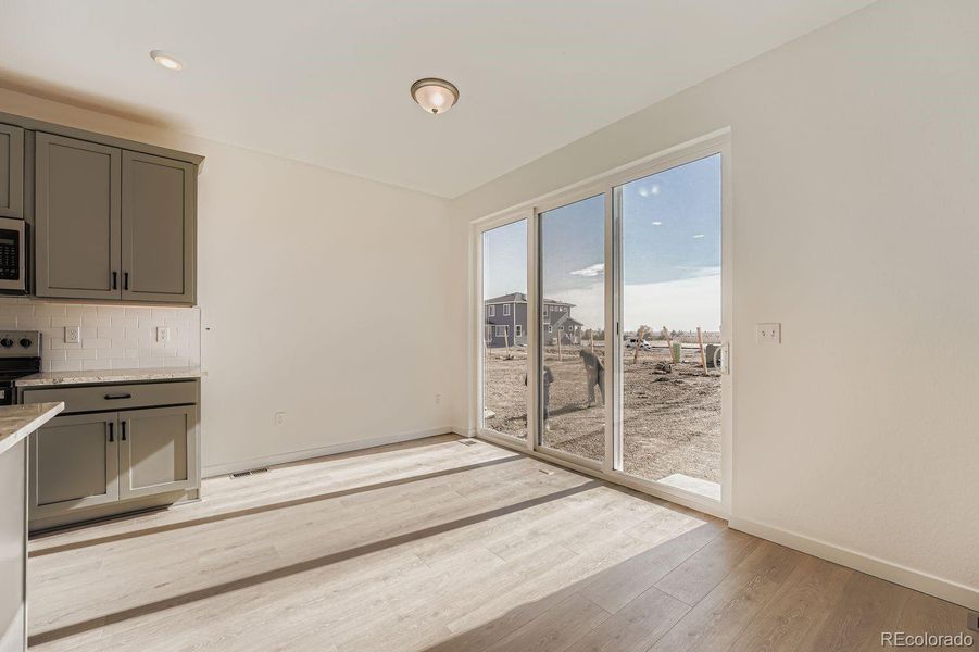 Images not from actual home, but are from same floor plan.