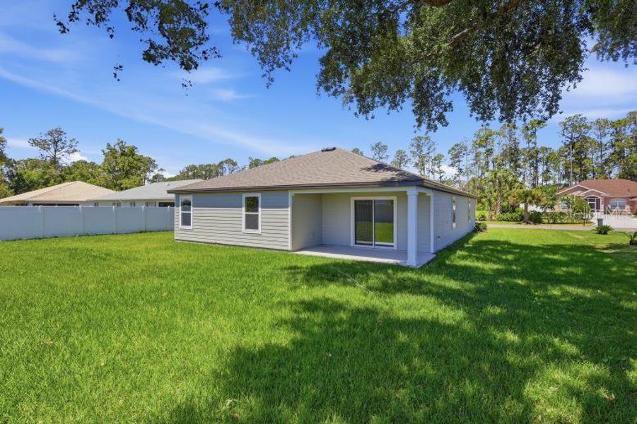 Exterior details and patio area of a home in Palm Coast, Palm Coast (Image 23).