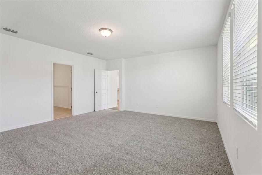 Spacious, unfurnished interior of a new home in The Meadow at Crossprairie, St. Cloud (Image 22).