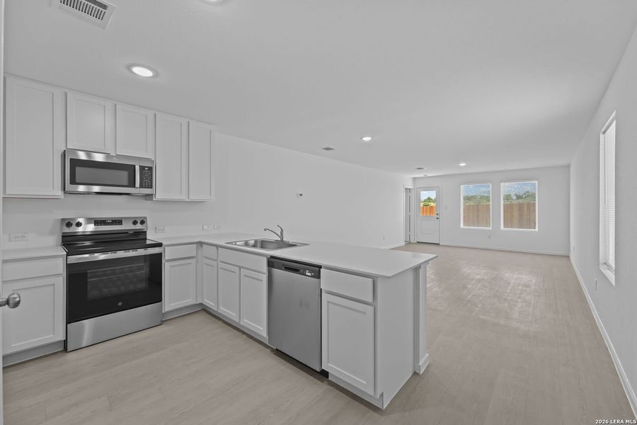 Furnished interior view inside a new home in Guadalupe Ridge, New Braunfels (Image 7).