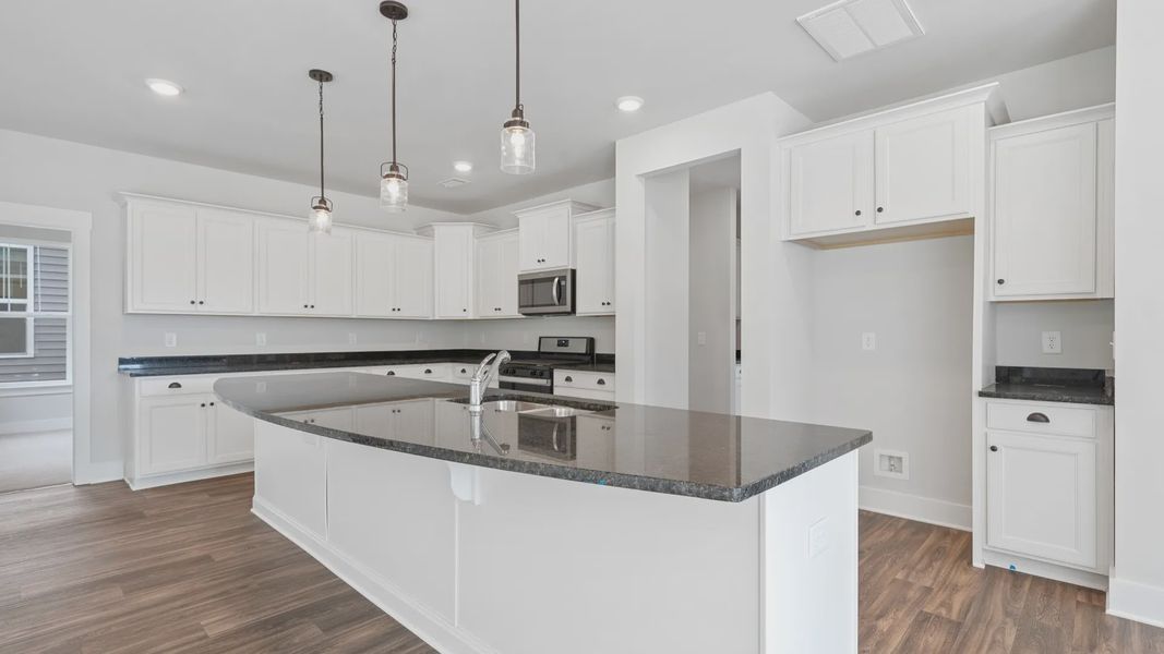 Representative furnished interior of a home built from the Stonefield - Finished Basement by DRB Homes in Pinebrook, Woodruff (Image 4).