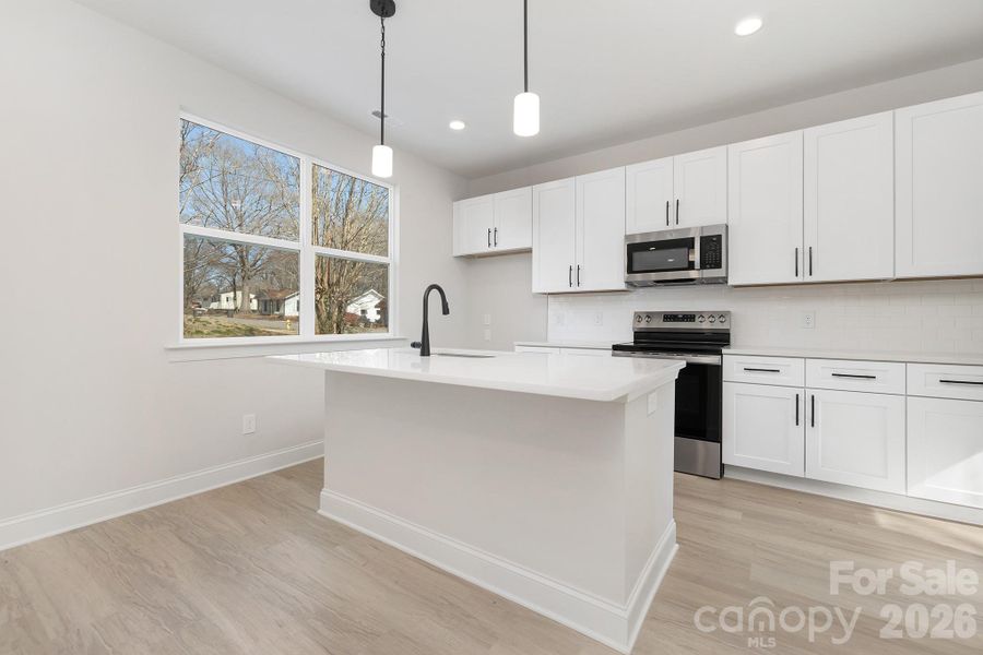 Furnished interior view inside a new home in , Statesville (Image 5).
