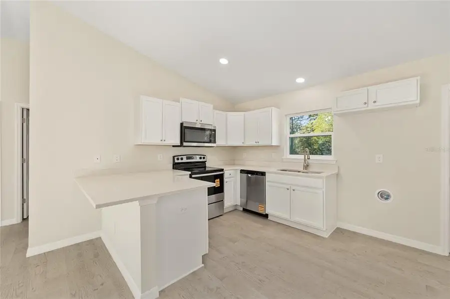 Furnished interior view inside a new home in , Ocala (Image 7).