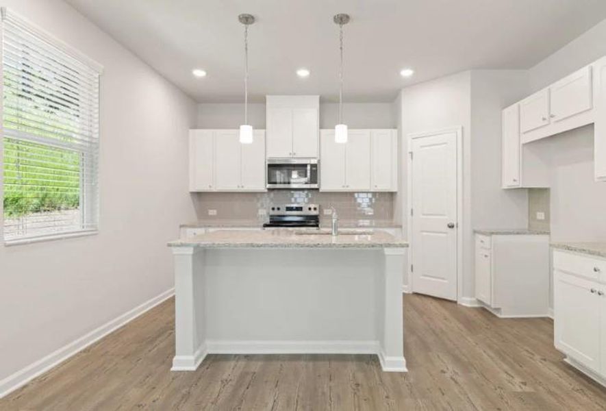 Furnished interior view inside a new home in Kingsley Creek, Lithonia (Image 2).