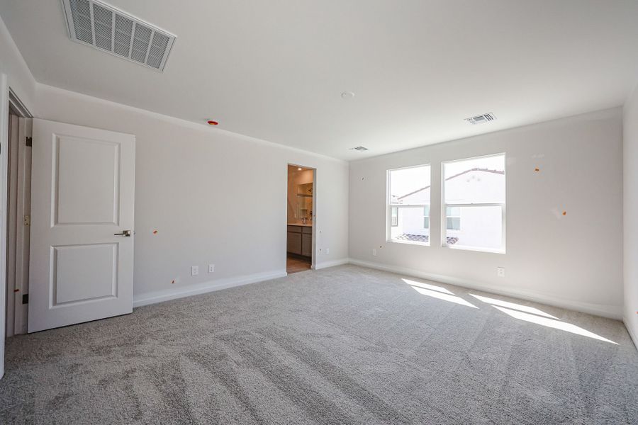 A room with white walls and a door. A room with white walls and a door.