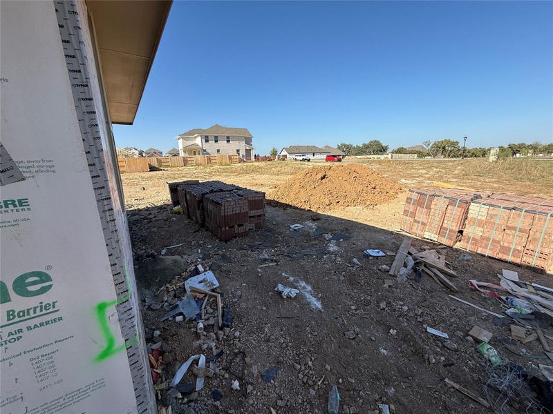 In-progress construction of a new home in The Cottages at La Cima, San Marcos, TX (Image 16).