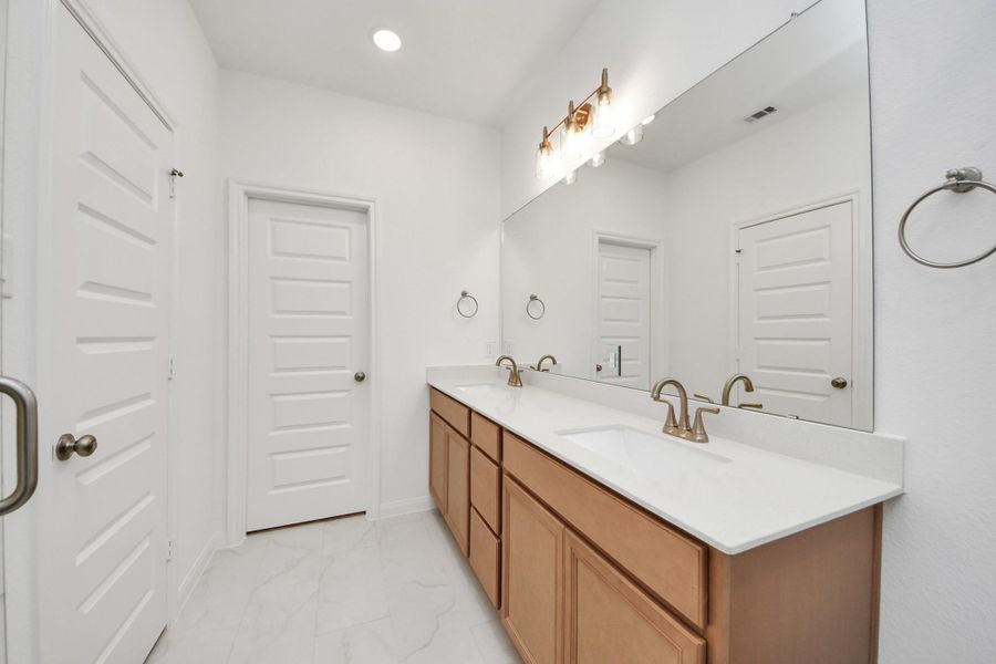 Furnished interior view inside a new home in Elyson, Katy (Image 14).