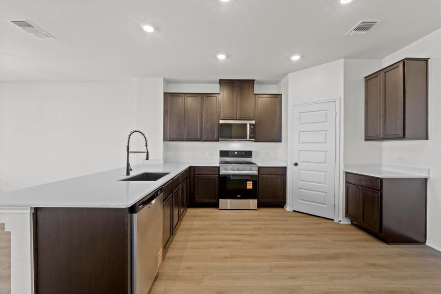 Furnished interior view inside a new home in Salerno - Heritage Collection, Round Rock (Image 6). Furnished interior view inside a new home in Salerno - Heritage Collection, Round Rock (Image 6).