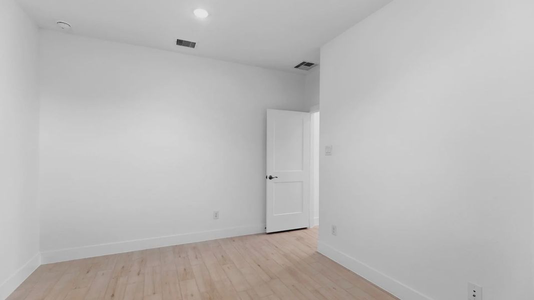Representative unfurnished interior of a home built from the Oakdale by Chesmar Homes in Bridgeland Courtyard, Cypress (Image 28).