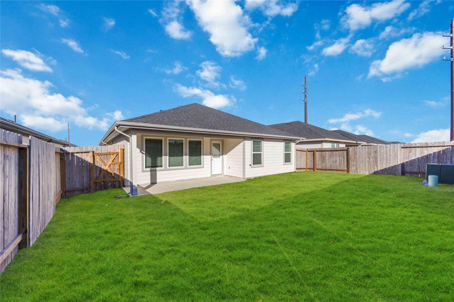 Exterior details and patio area of a home in Tamarron, Fulshear (Image 4).