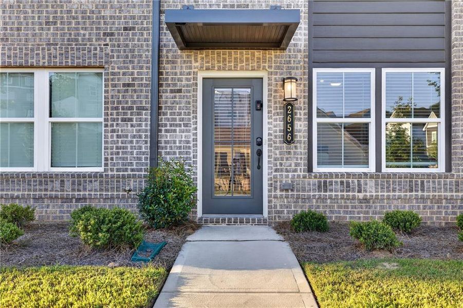 Exterior details and patio area of a home in , Atlanta (Image 1). Exterior details and patio area of a home in , Atlanta (Image 1).