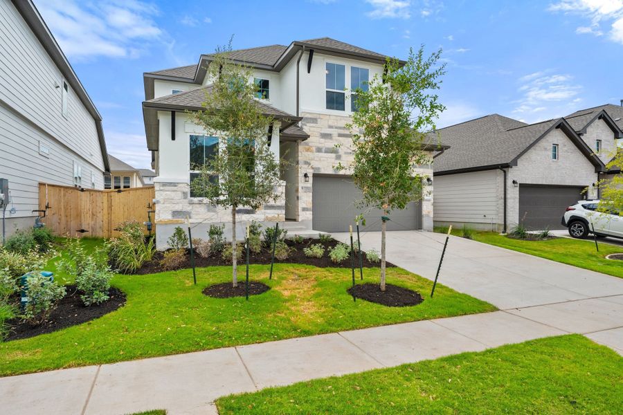 Front exterior of a new home in Park Central, Georgetown, TX, highlighting curb appeal (Image 24).