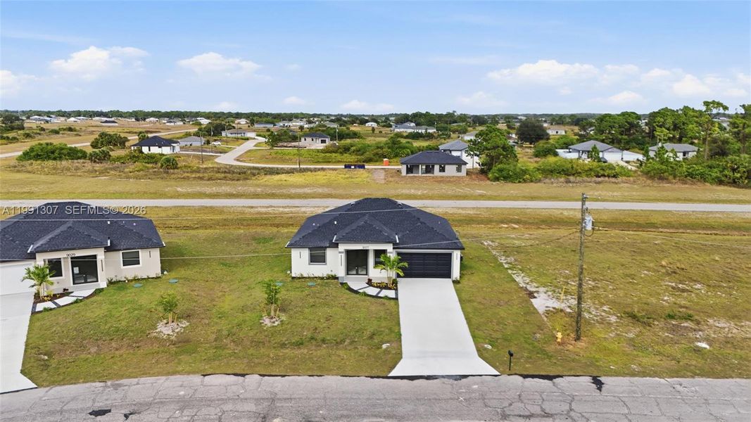Front exterior of a new home in , Labelle, FL, highlighting curb appeal (Image 2). Front exterior of a new home in , Labelle, FL, highlighting curb appeal (Image 2).