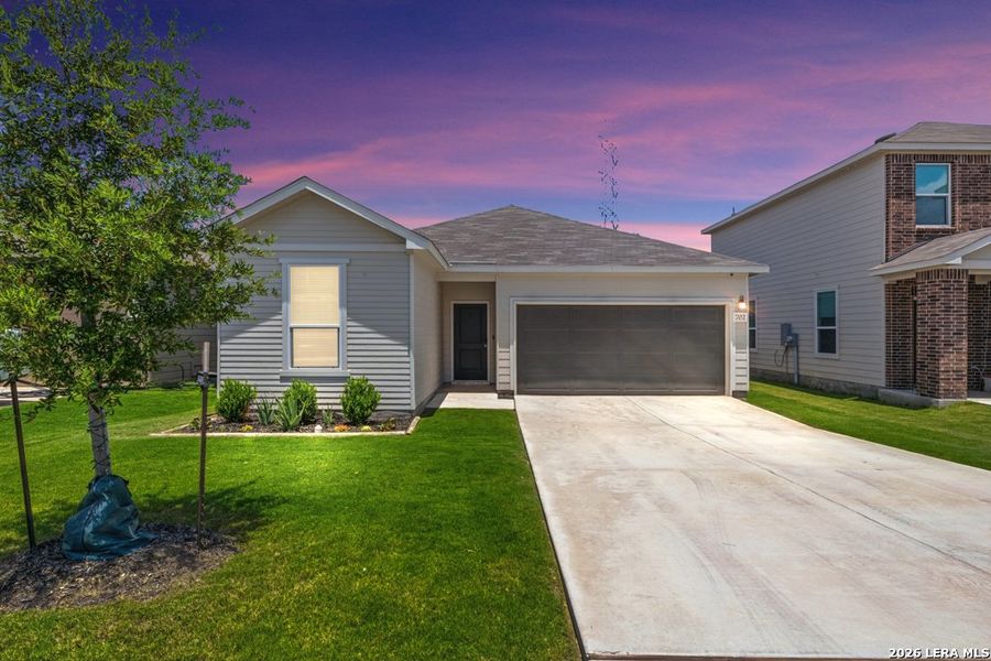 Front exterior of a new home in Briarwood Oaks, San Antonio, TX, highlighting curb appeal (Image 19).