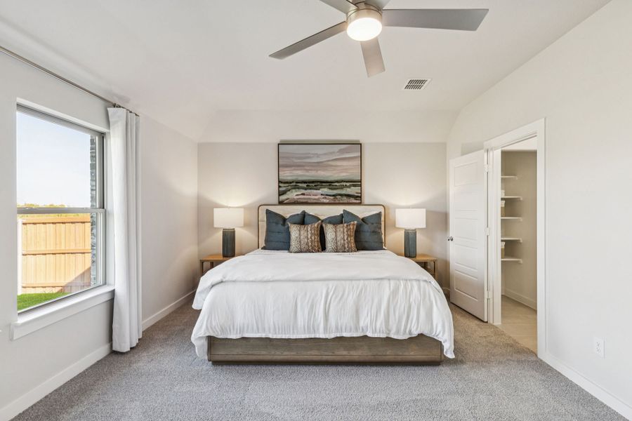 Primary Suite in the Oscar home plan by Trophy Signature Homes – REPRESENTATIVE PHOTO